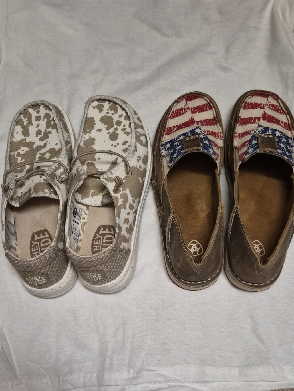 Hey Dude 6W Slip-On Moccasins in Beige Print and Ariat 7 Brown with Flag Accent.